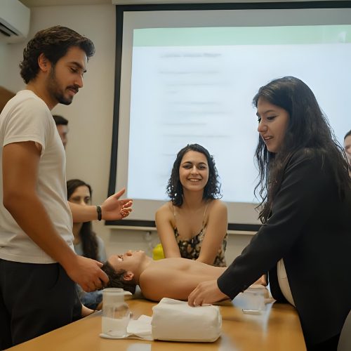 First aid training session with CPR practice